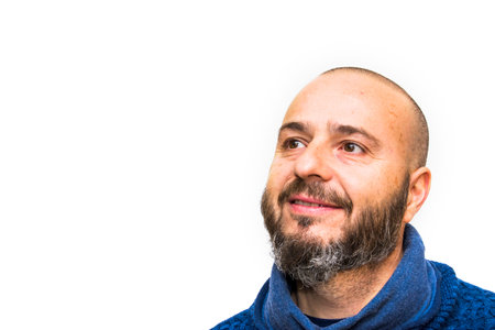Handsome, bald man with beard on white backgroundの写真素材