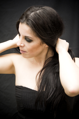Beauty Woman Portrait over black Backgroundの写真素材
