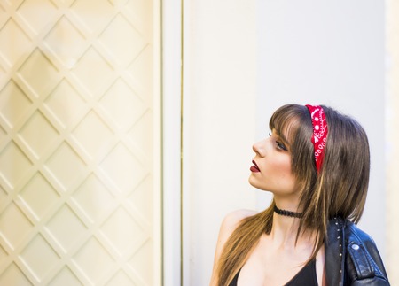 Portrait of a beautiful woman  in the street window shoppingの写真素材