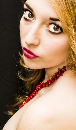 Beauty Woman Portrait over black Backgroundの写真素材