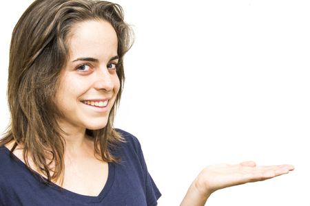Portrait of a beautiful woman with her open hand on white backgroundの写真素材