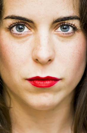 Portrait of a beautiful woman on black backgroundの写真素材