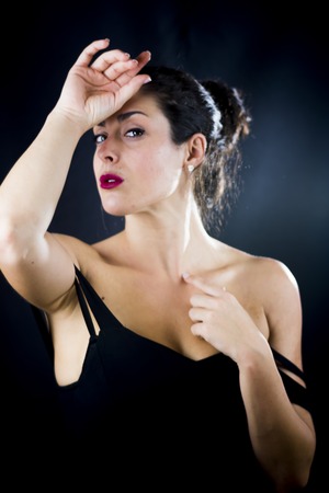 Beautiful woman on black backgroundの写真素材
