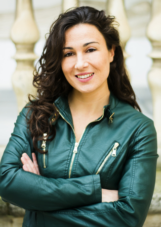 Beautiful woman with brunette hair in the parkの写真素材
