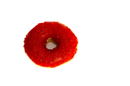 Sweet tasty donut with colorful sprinkles isolated on white backgroundの写真素材