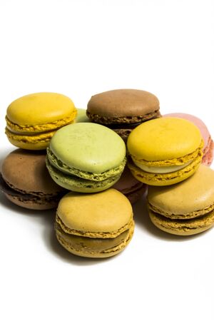 Colored macarons isolated on white background, typical French dishの写真素材