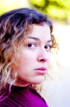 Portrait of beautiful woman in the parkの写真素材