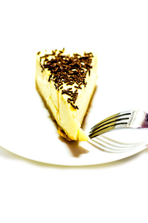 Portion of delicious chocolate cake on white background