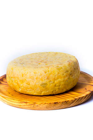 Spanish omelette on a wooden tray on white backgroundの写真素材