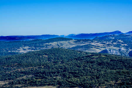 Mountain landscape with mountains in the distanceの写真素材