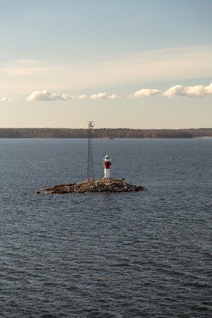 Finland, Archipelago of Turku, lighthouse Rajakari at the seaway that divides the route to Naantali and Turku on a spring dayの写真素材