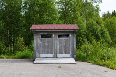 Lapland Finland, toilet on the side of a parking lot on a summer dayの写真素材