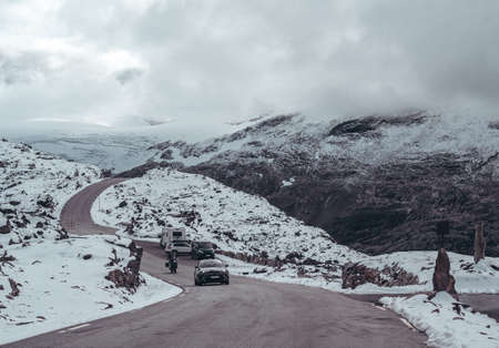 Editorial 09.07.2019 Dalsnibba Norway, people arriving to the mountain top of Dalsnibba with the snowy mountain tops in the backgroundのeditorial素材