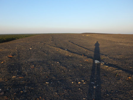 shadow on the mining heap