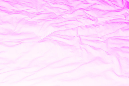 Pink fabric wrinkled can be used as a background imageの写真素材