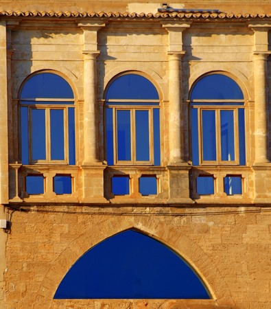 view on an old and modern window in the old town of Palma de Majorcaの写真素材