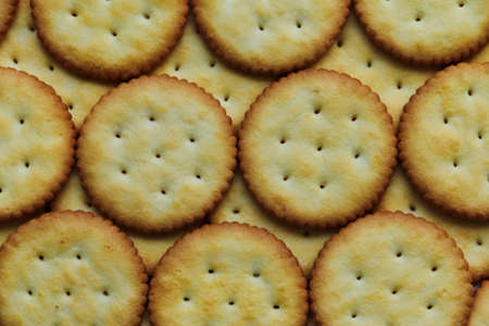 Texture of circle biscuits stacked backgroundの写真素材