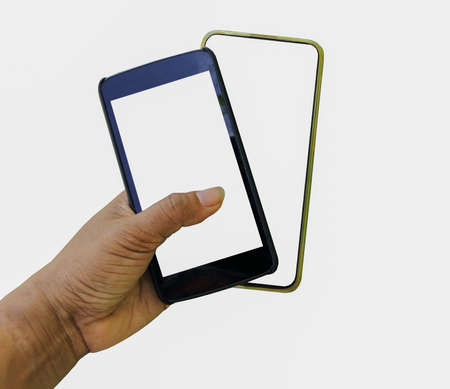 Hand keeping two cell phone connect internet for normal lifestyle global on white backgroundの写真素材