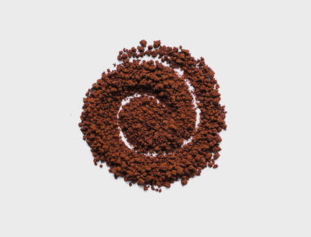 The black hole of coffee powder shape on white backgroundの写真素材