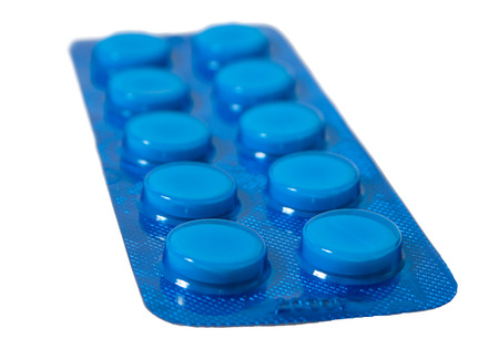 close up of pills in blue packetの写真素材