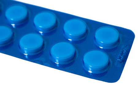 Close up of pills in blue packetの写真素材