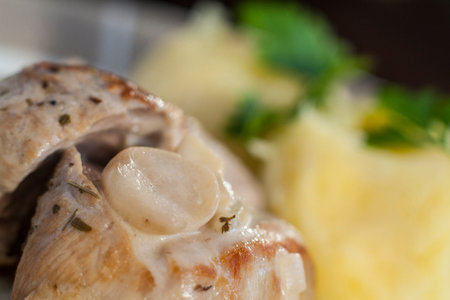 Close-up Roasted pork tenderloins with champignon mushroom gravy and potato pureeの写真素材