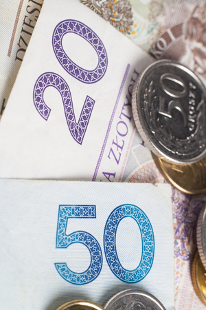 Close up fifty and twenty zloty bill and fifty grosz coinの写真素材