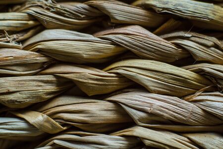 Macro closeup on weave of natural straw table mat round braidedの写真素材