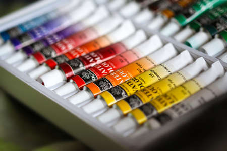 Close up of palette with colorful aquarelle tubes for nails paintingのeditorial素材