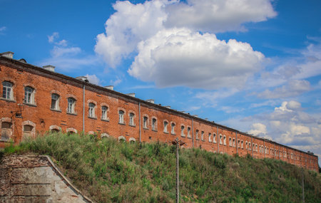 Red brick barracks building within the Modlin Fortress is one of the longest buildings in Europeのeditorial素材