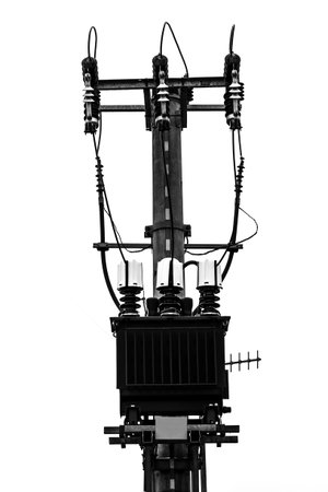 Pole mounted transformer station from medium to low voltage, black and white image