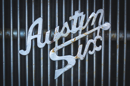 Brand logo on radiator grille of Austin Six car from 1939