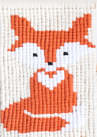 Macrame technique hand woven wall hanging depicting red fox