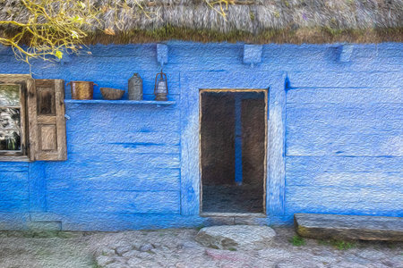Old wooden blue country house with thatched roof, image with oil painting effectの写真素材
