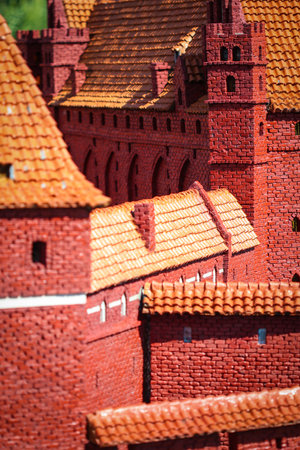 Close-up on miniature red brick gothic,castleの写真素材