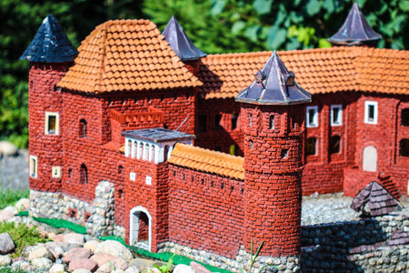 Close-up on miniature red brick gothic,castleの写真素材