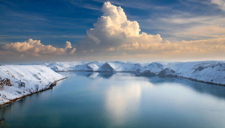 River or fjord amidst snow covered mountains, AI generated imageの写真素材