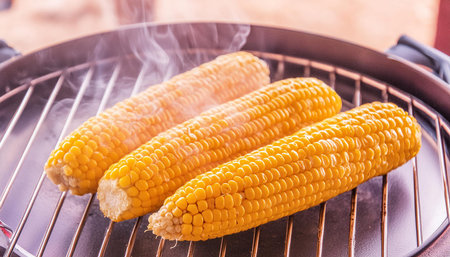 Close up on corn on the cob cooking on the grill, AI generated image