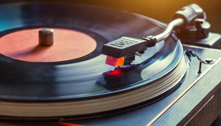 Closeup on vinyl record on record player with tonearm, AI generated image