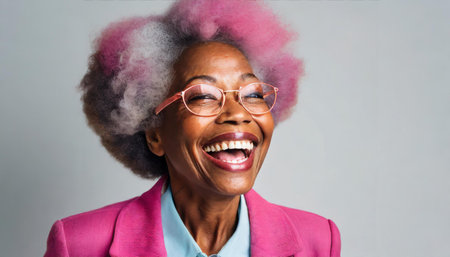 An elderly woman is beaming with joy, sporting vibrant pink hues in her hair and a bright pink blazer, AI generated imageの写真素材