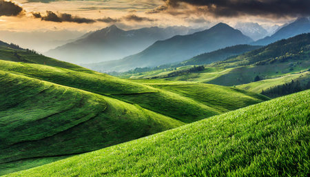 A serene landscape showcasing vibrant green hills with the sun rising behind misty mountains,...