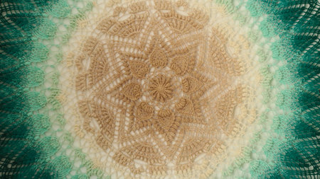Circular crochet mandala with shades of green and beige, showcasing intricately handmade needleworkの写真素材