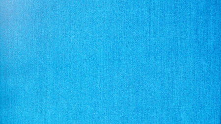 Uniform blue surface with subtle texture adding depth and visual interestの写真素材