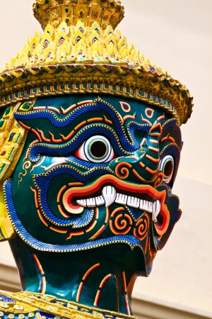 A kind of mythological soldier next to a chedi in Grand Palace Thailand, Bangkok  の写真素材