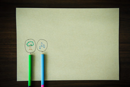 pencil with a speech bubble isolated on brown paper background