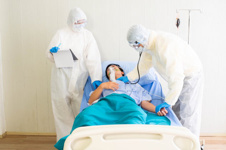 Doctor Checking infected patient in quarantine room Covid-19 () outbreak or Covid-19, doctors in the...