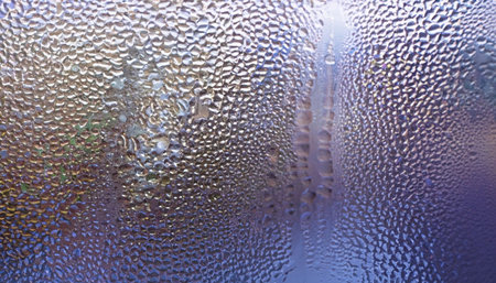 Water drops on the window, close-up. Abstract background.の素材