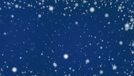 Snowfall on dark blue background. Falling snowflakes. Winter background.の素材
