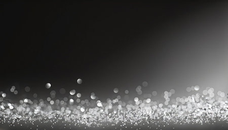 glitter vintage lights background. silver and black. de-focusedの素材