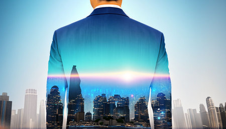 Back view of businessman looking at modern cityscape and sunlight. Mixed mediaの素材